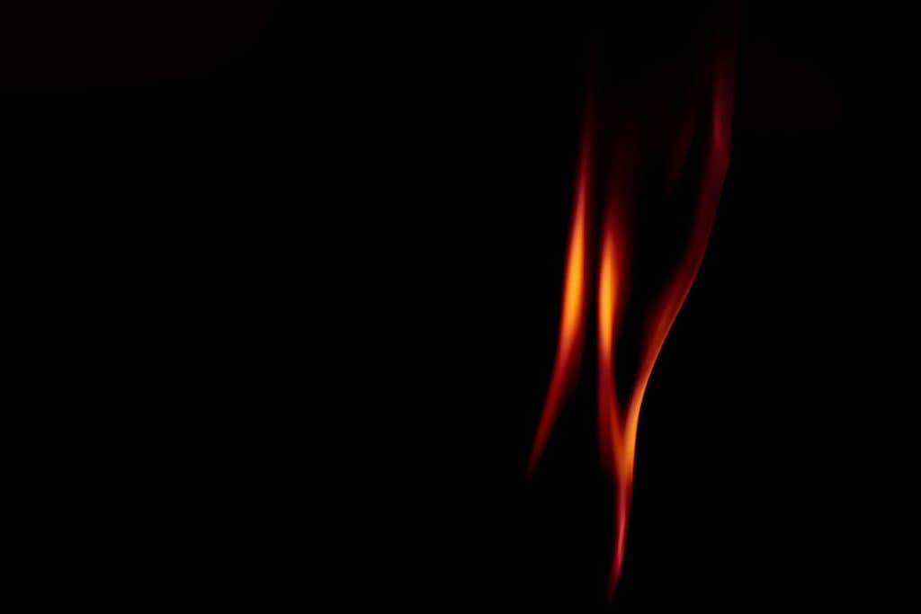 An image of a flame with a sleek design representing Legacy Risk Advisors individual services .